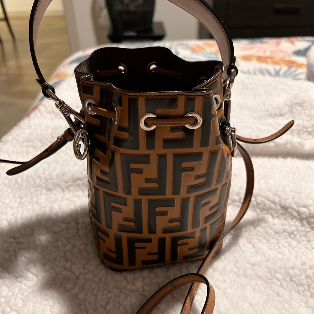 Authentic Fendi embossed leather Monser Tresor